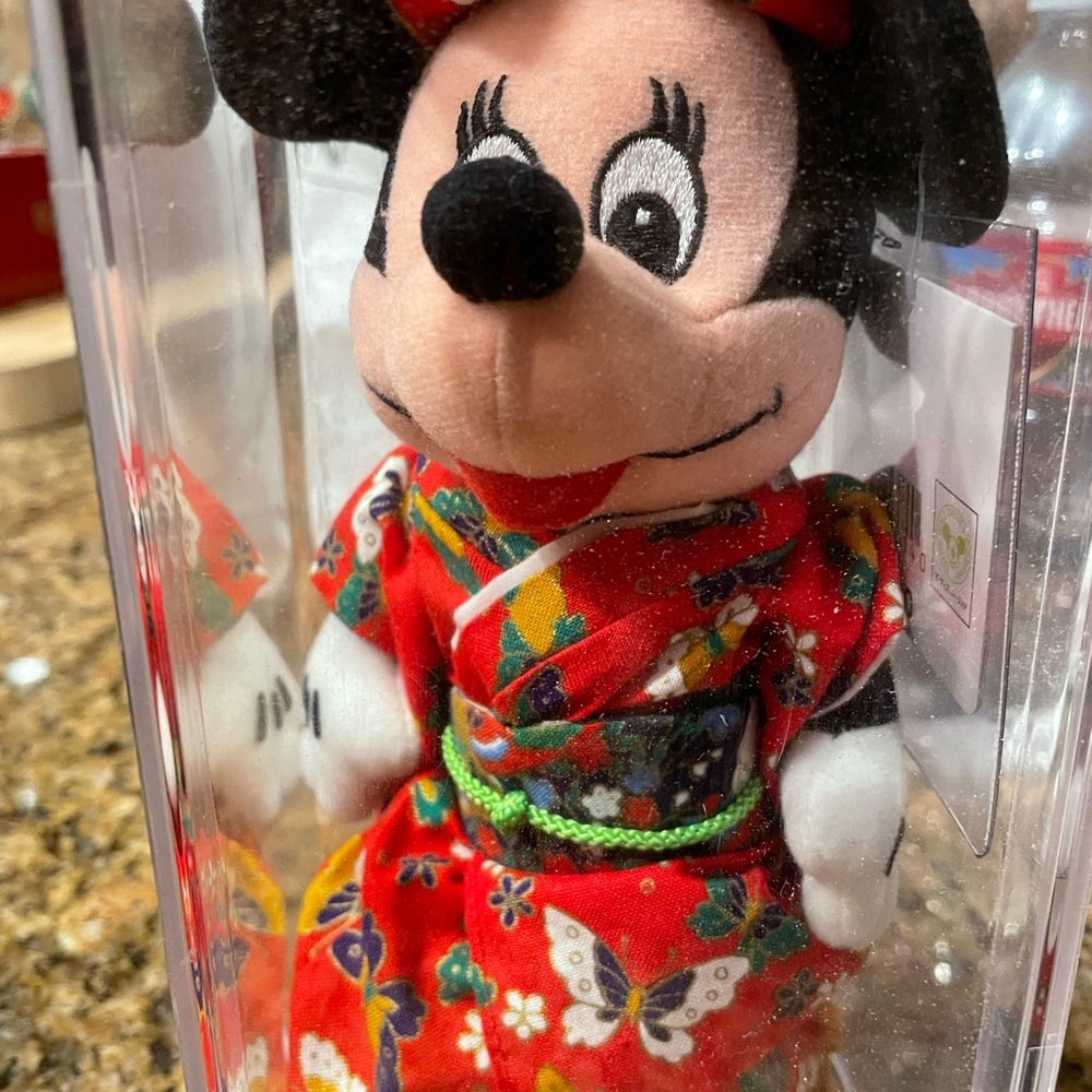 Disney holiday collectibles in their plastic protected container - Picture 2 of 3